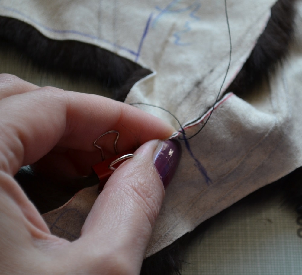 Tighten a stitch as shown