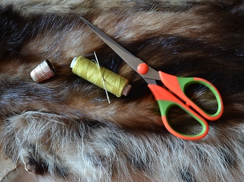 Sewing Of Natural Fur By Hand Stitch