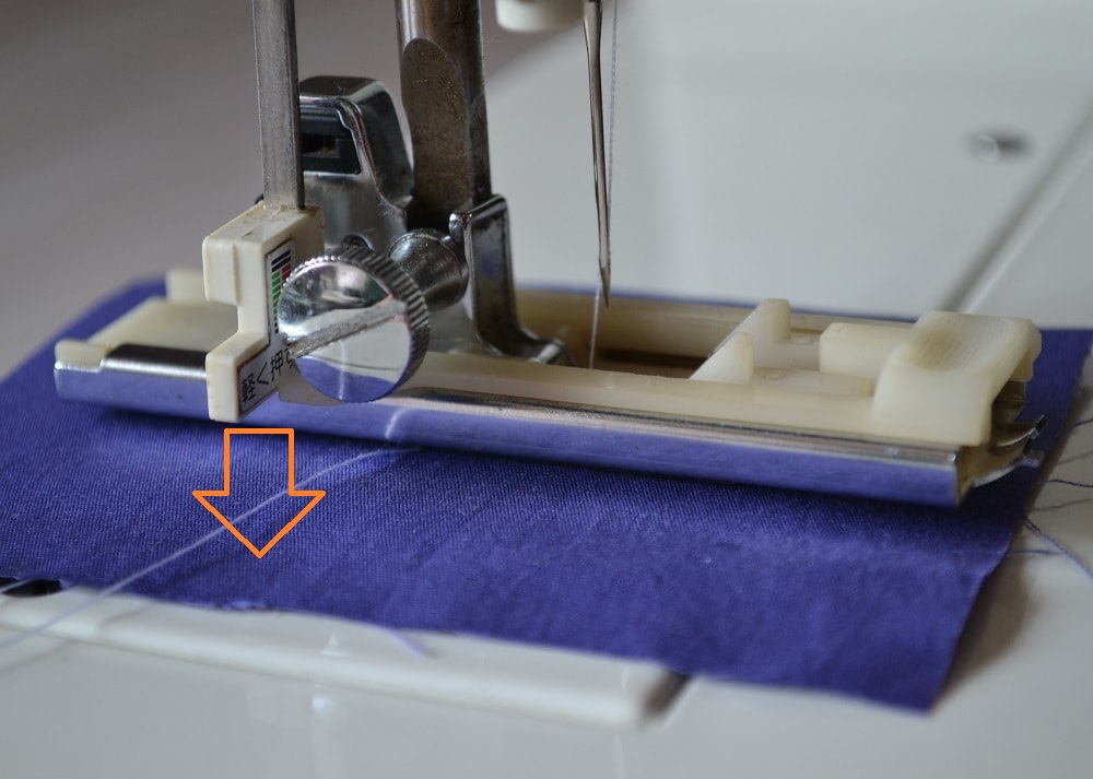 Sewing machine with automatic buttonhole feature