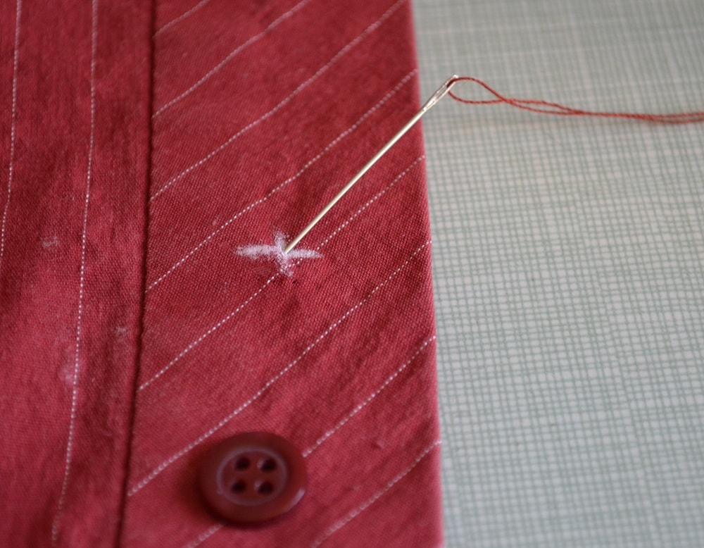 Pierce the needle on front side of shirt fabric