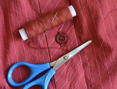 How to Sew a Button on a Shirt