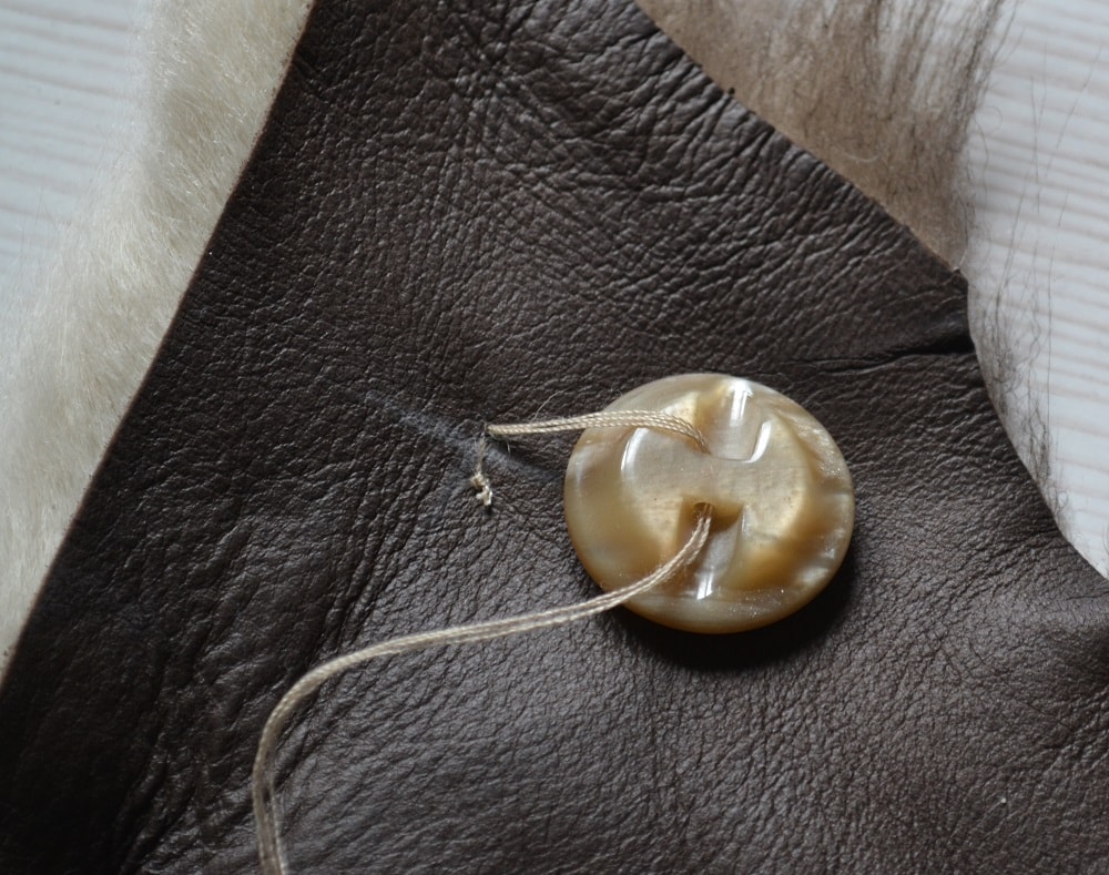 First steps of sewing a big button