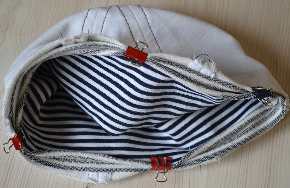 Attaching striped band to bottom a hat