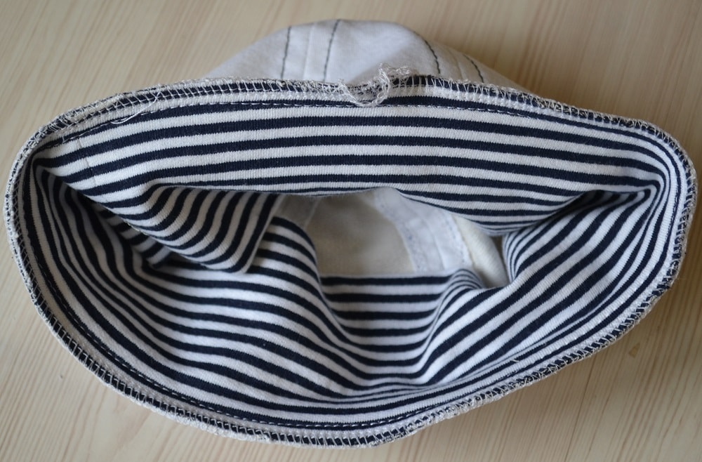 Sewing stretchy baby hat is over
