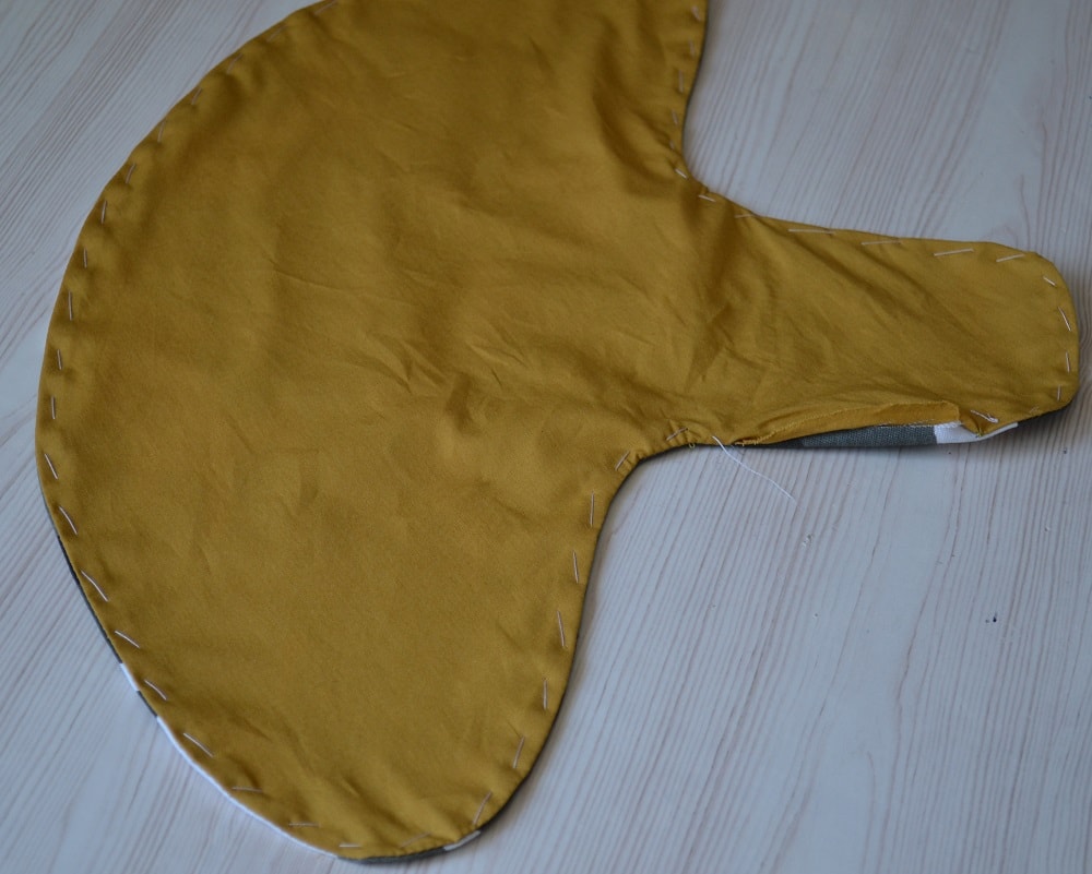 Baste stitches along the edges