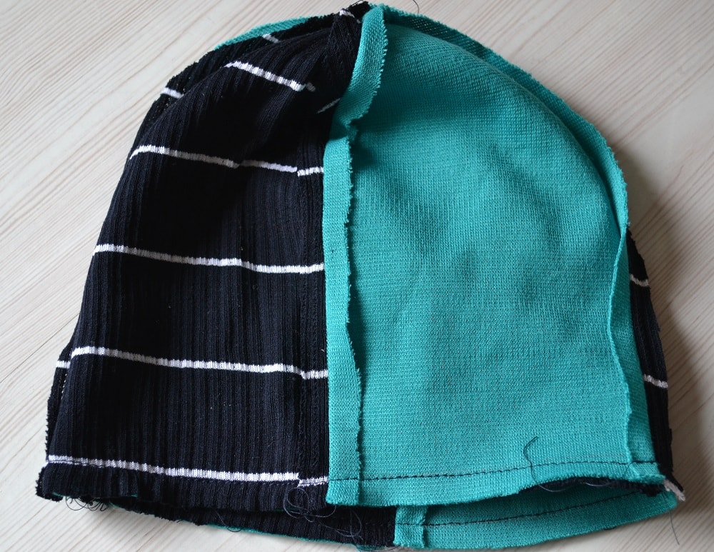 Stitch around the edge of beanie hat
