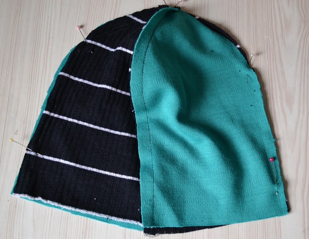 Pin both details of hat