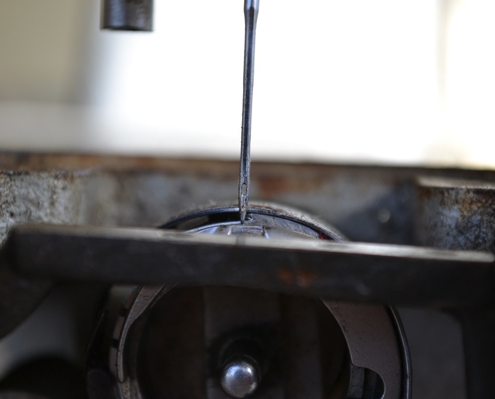 Position a shuttle hook tip