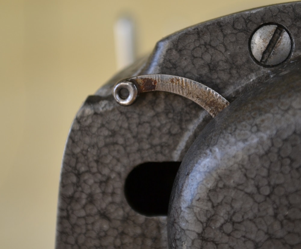 The thread take-up lever