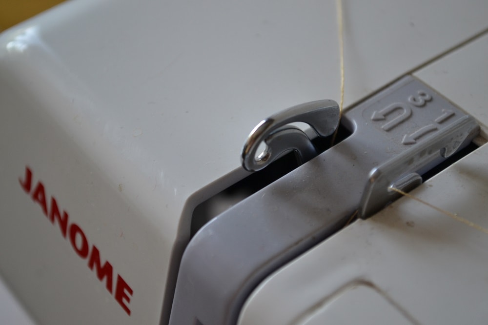 Threading a sewing machine step by step
