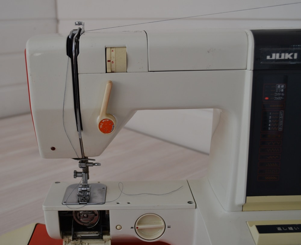Threading a sewing machine