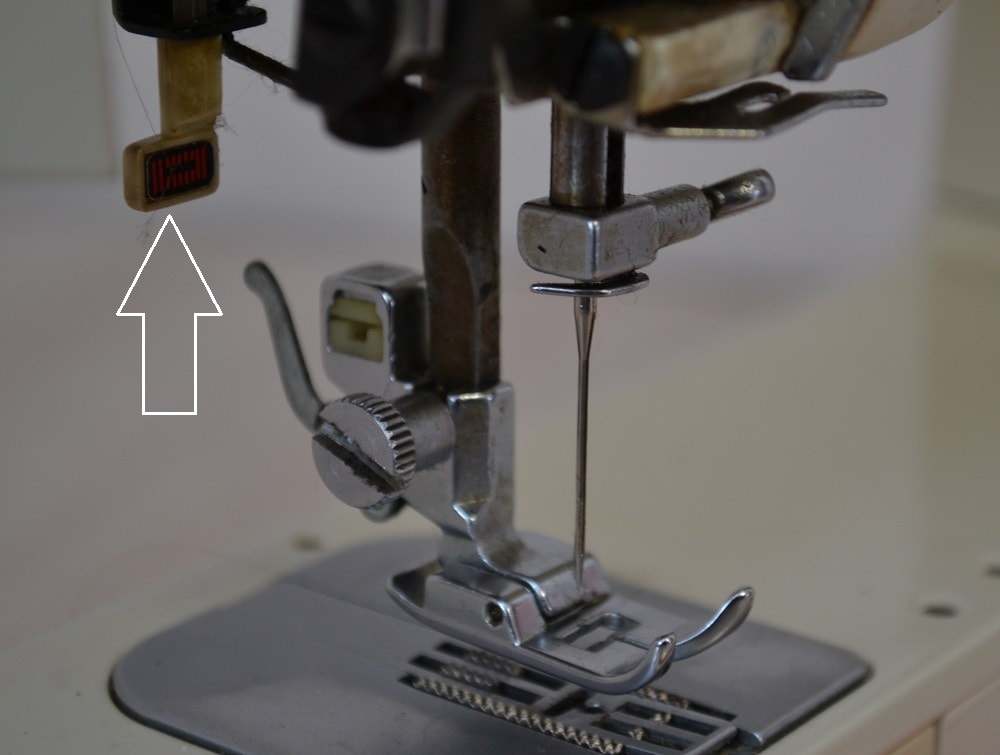 Lever for making an automatic buttonhole