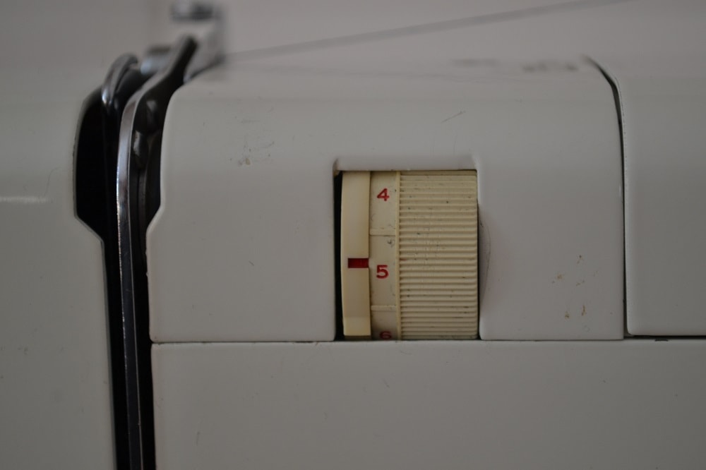 Regulator of upper thread tension