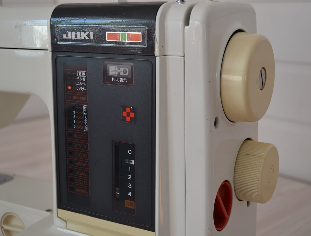Stitch selector and stitch length dial