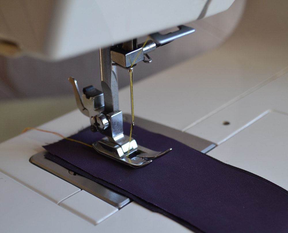 Place fabric under the presser foot