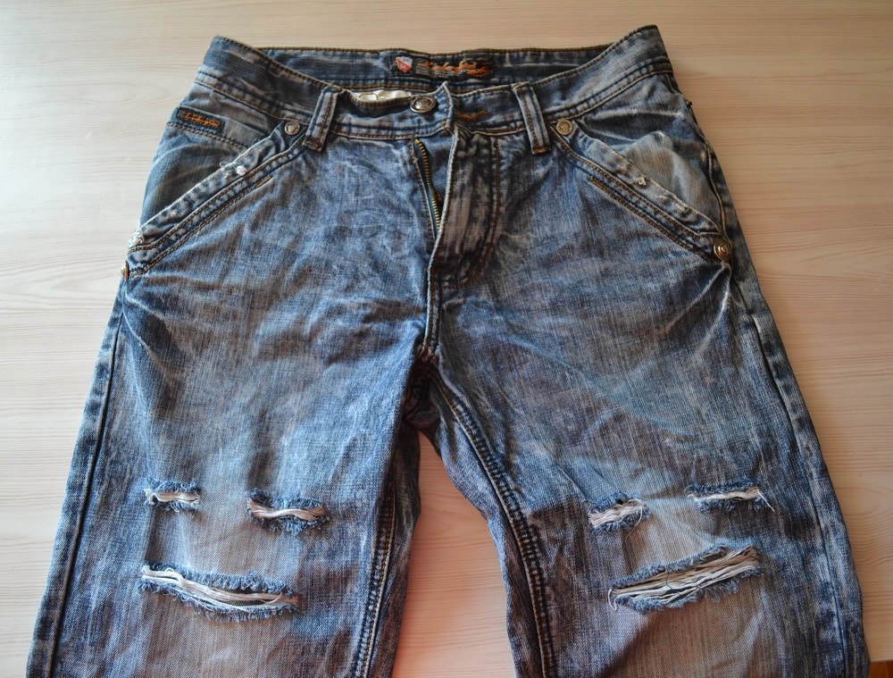 Old jeans with rips and holes