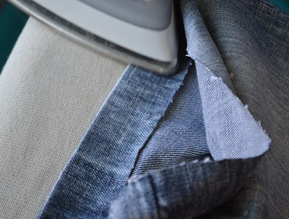 Fold bottom of shorts and press hem
