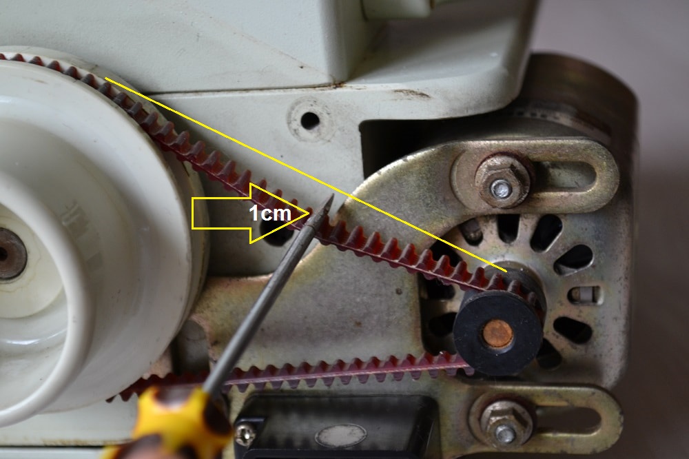 Drive belt should fall down about 1 cm