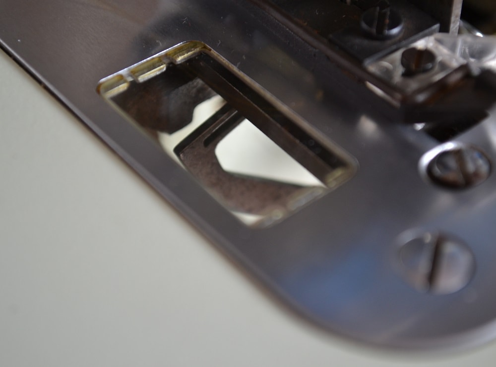 Special glass window on needle plate