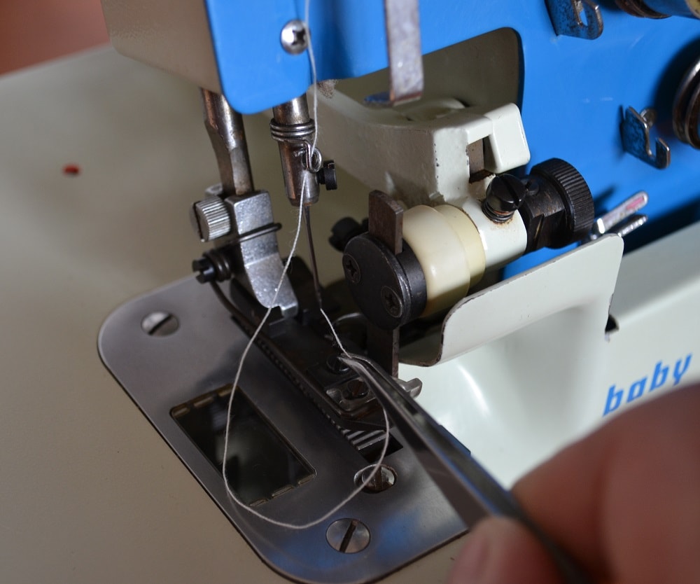 How to insert thread into needle eye
