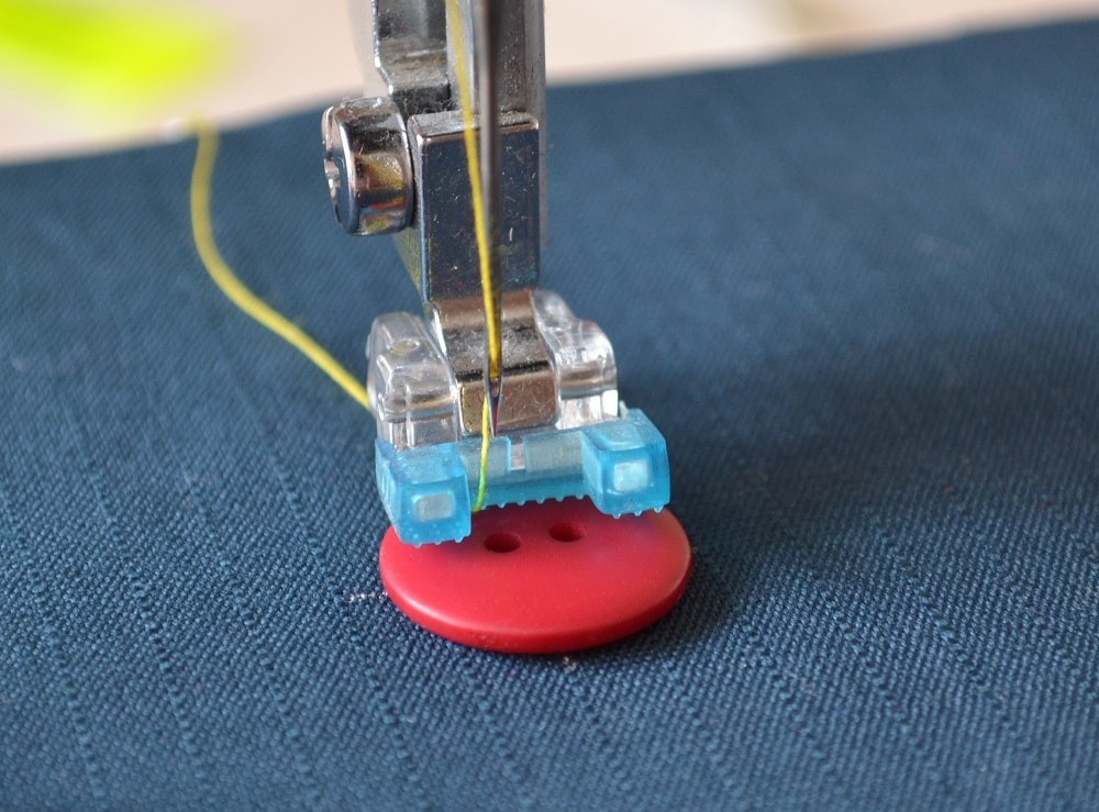 Place the button under the presser foot