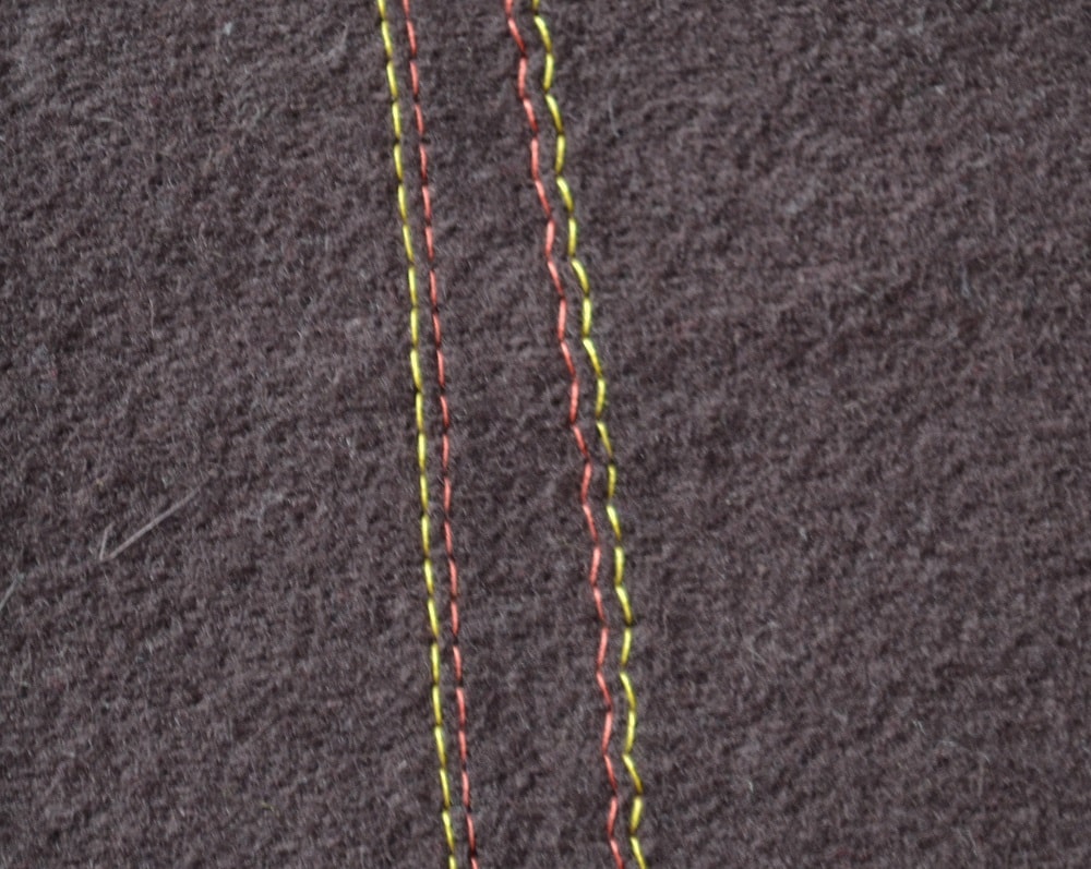 Stitch line with two needles