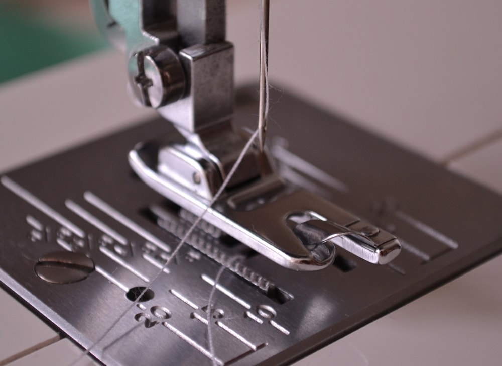In middle of presser foot is a snail
