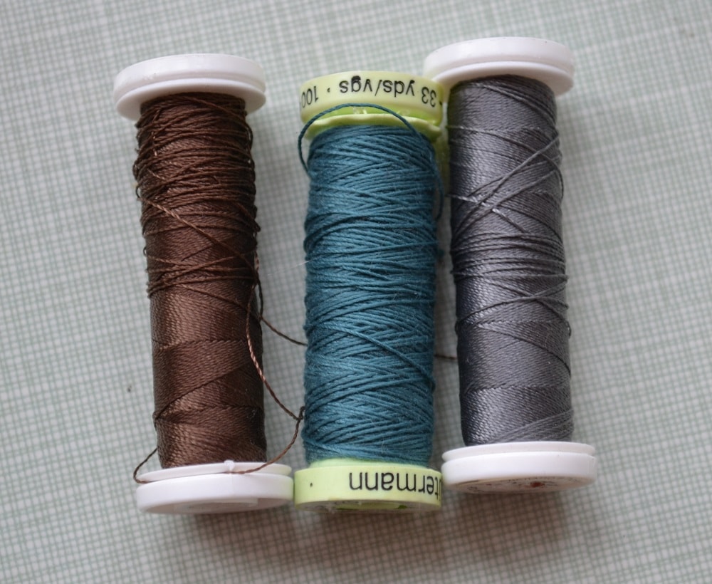 Decorative finishing threads