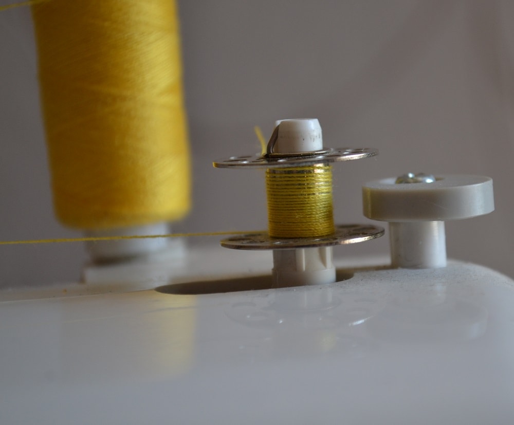 Never wind the bobbin by hand
