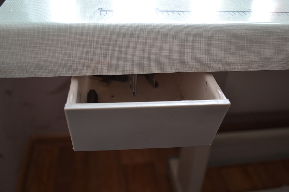 Convenient drawer for storing sewing accessorie