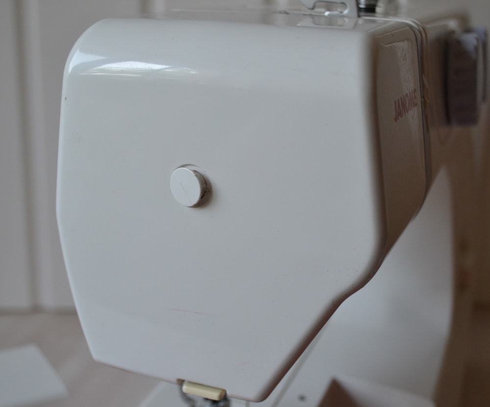 Remove a cap of hole on front cover