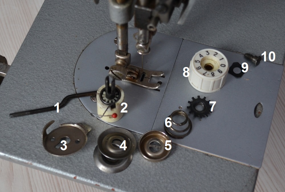 Parts of thread tensioner of old sewing machine