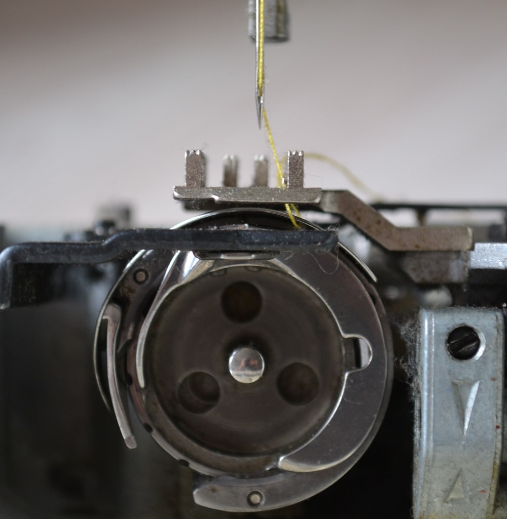 Shuttle hook make two full turns
