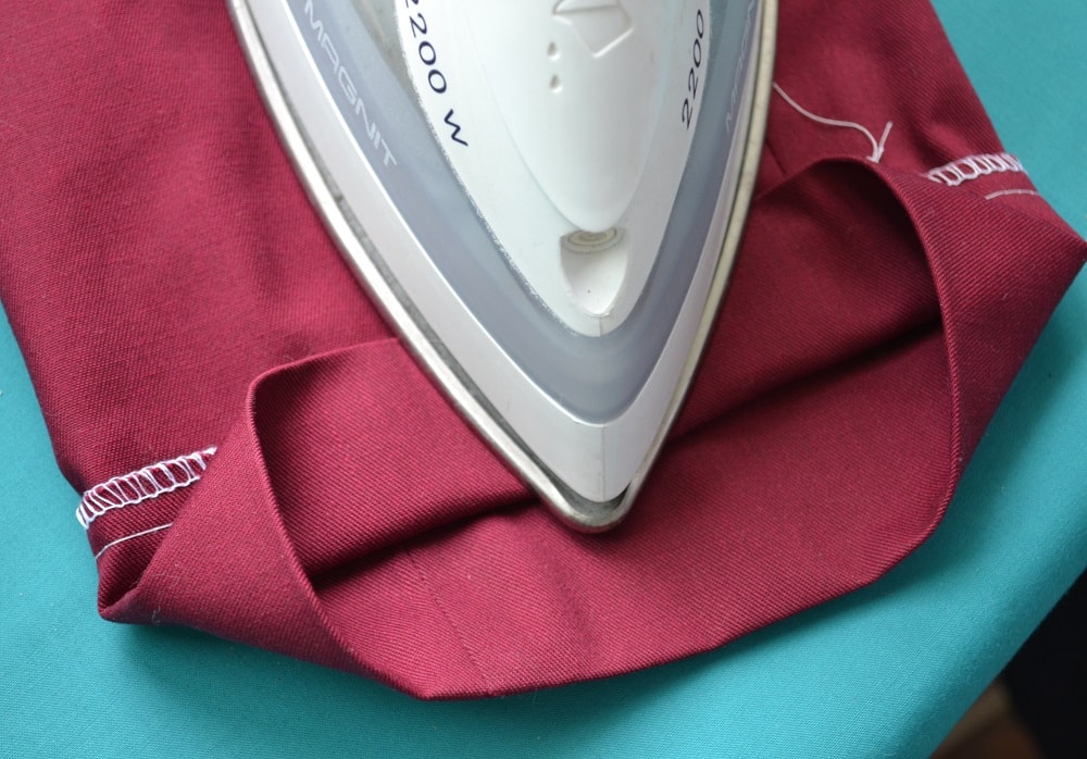 Folding the cuff in half