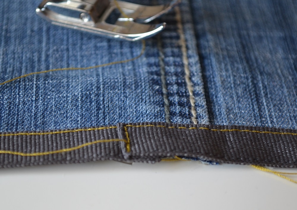 At end of tape turn and sew short vertical segment