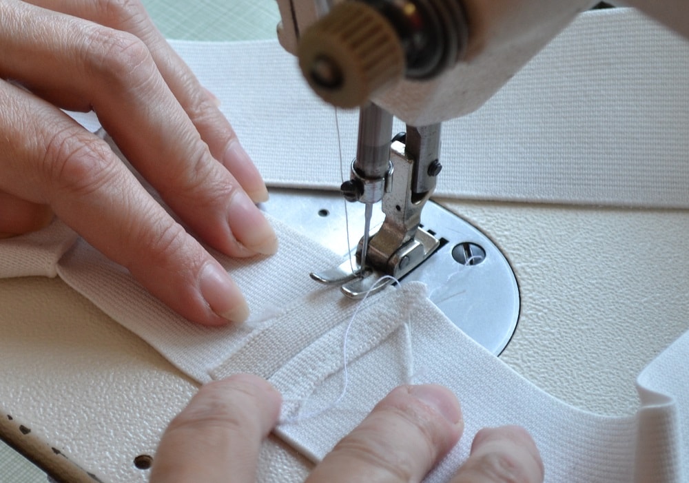 Sew both sides of elastic strip together