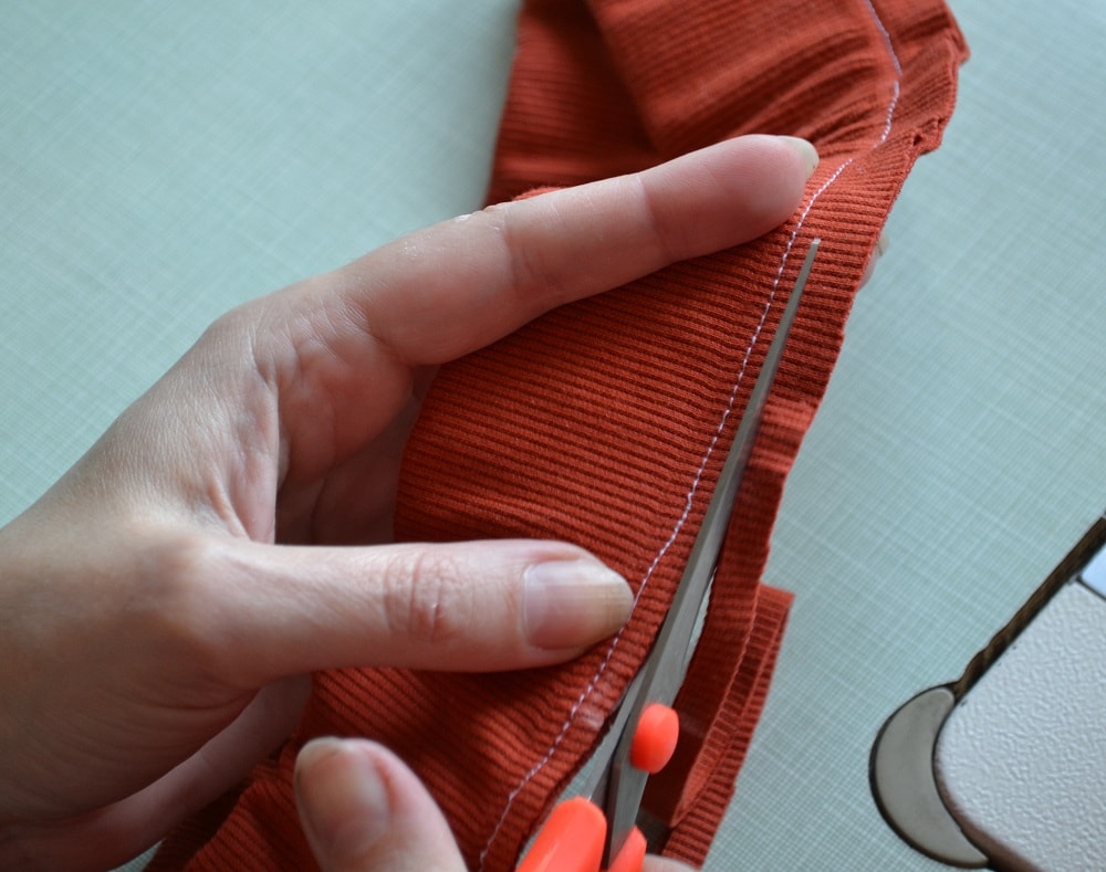 Cut fabric along the seam