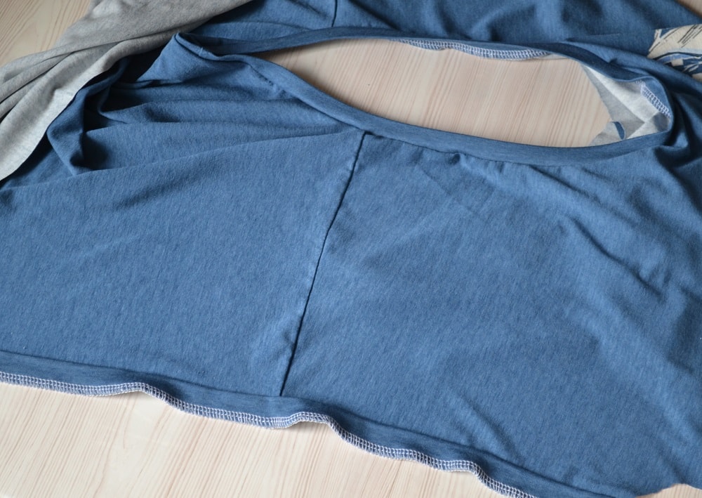 Serge around armholes of t-shirt