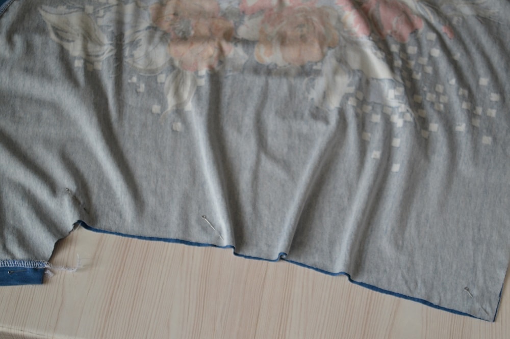 Last steps of sewing of knit t-shirt