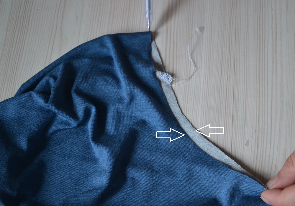Fold neckline according to earlier made marks