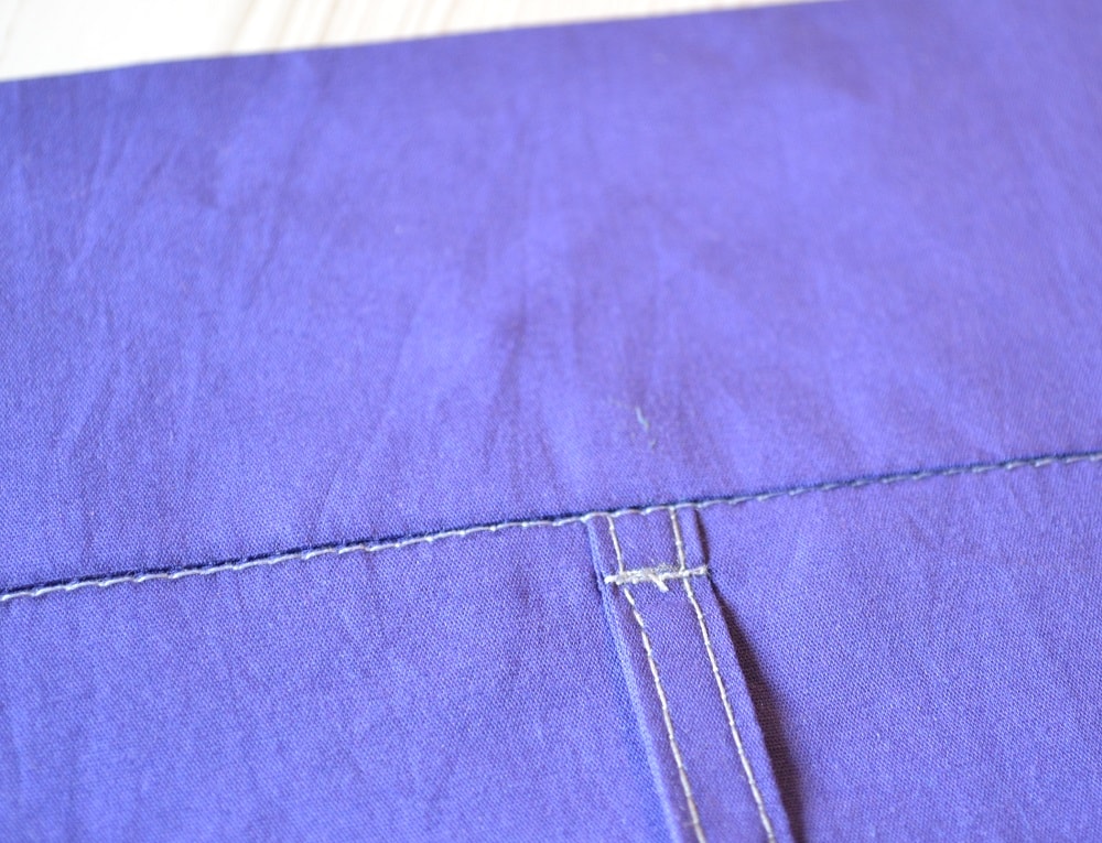 Make a stitch line close to the bottom edge of belt