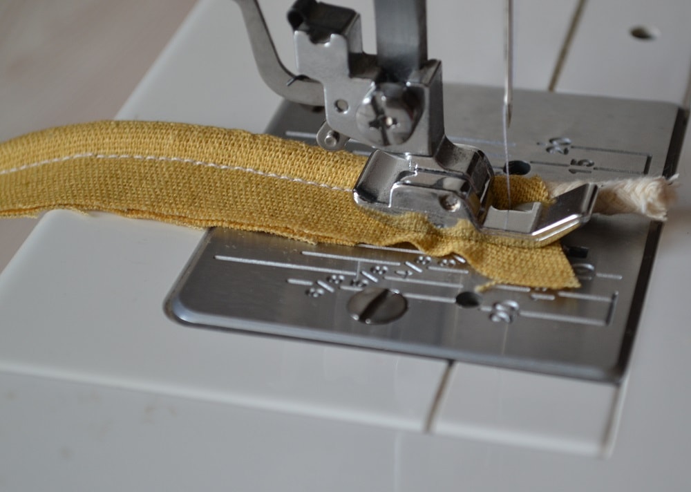 Bias tape with cord inside at the end of sewing
