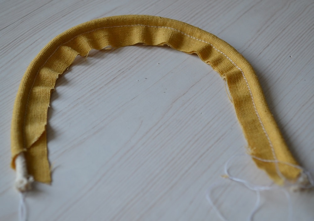 Seam lies closer to edge of cord