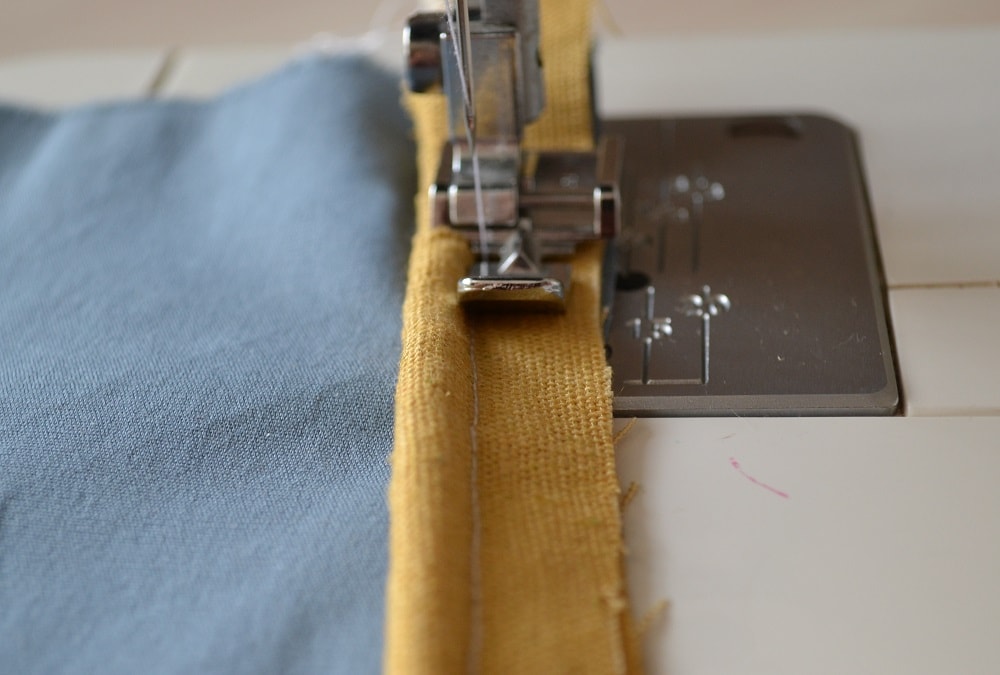 Stitching piping along one part of fabric