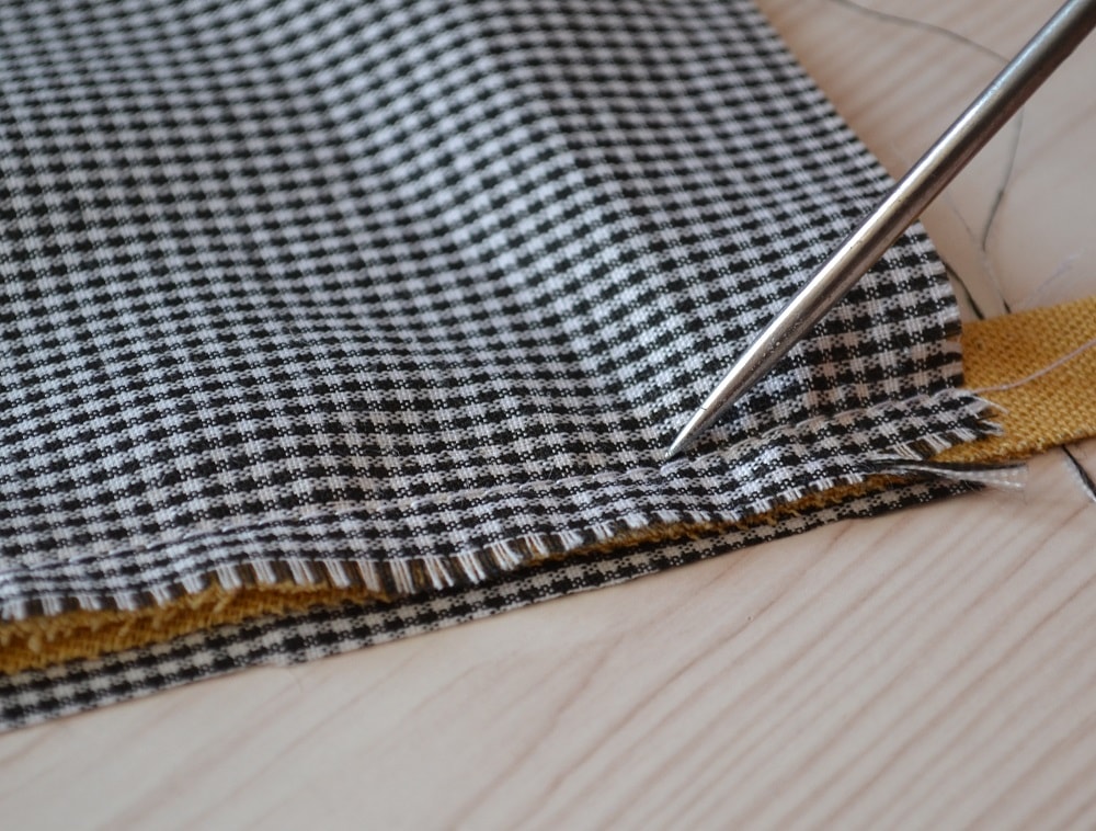Pin both edges of fabric together