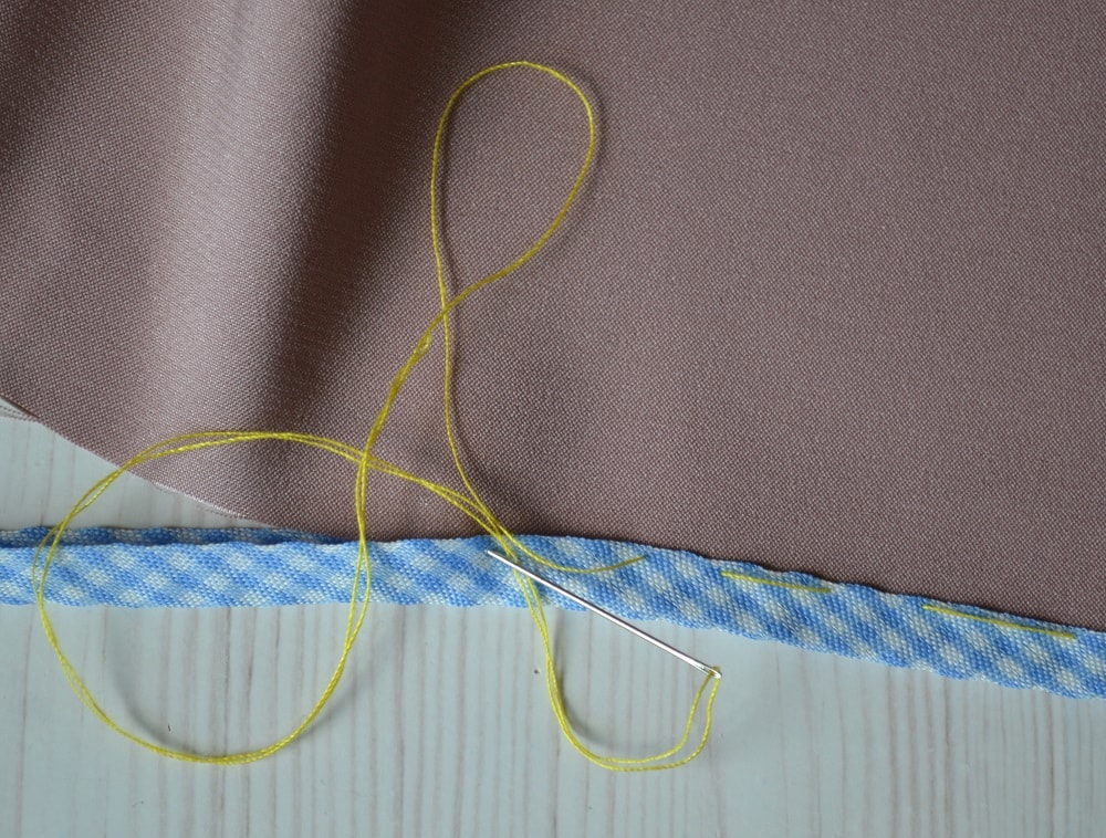 How to baste bias tape with hand stitches