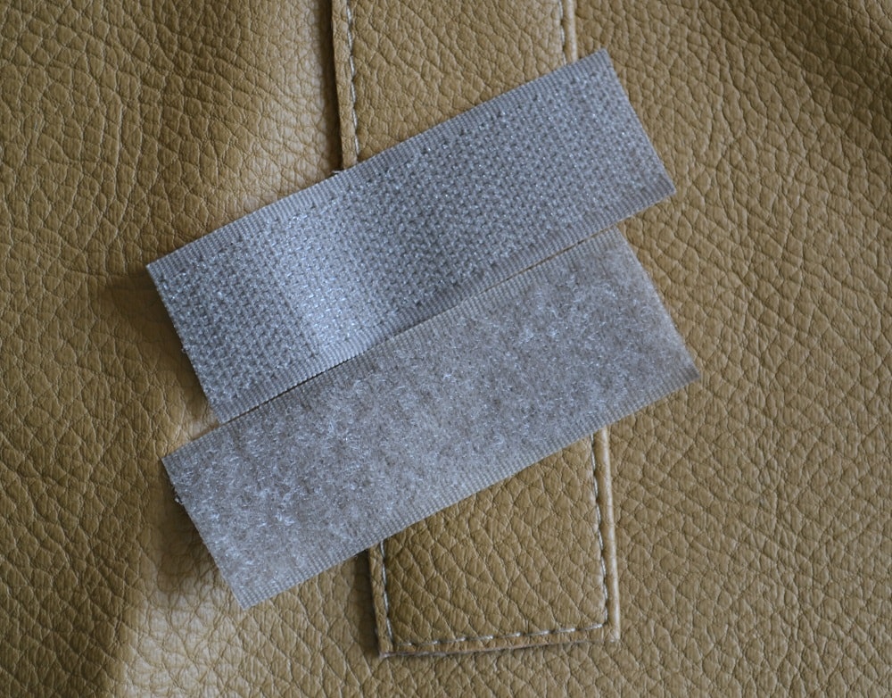 Pieces of genuine leather imitate a clasp