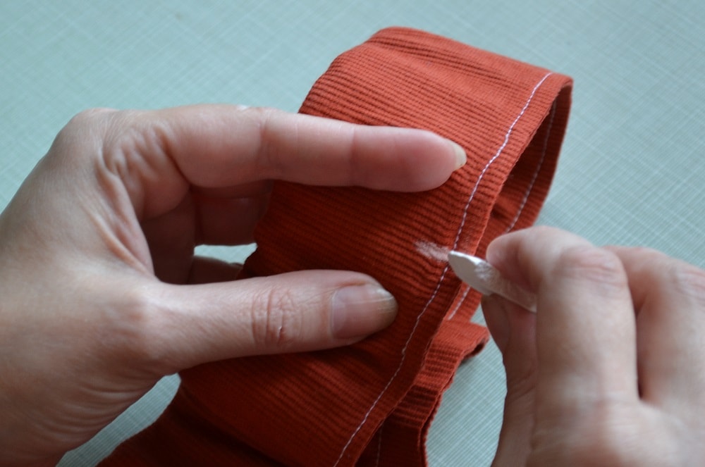 Mark the waistband into four equal pieces