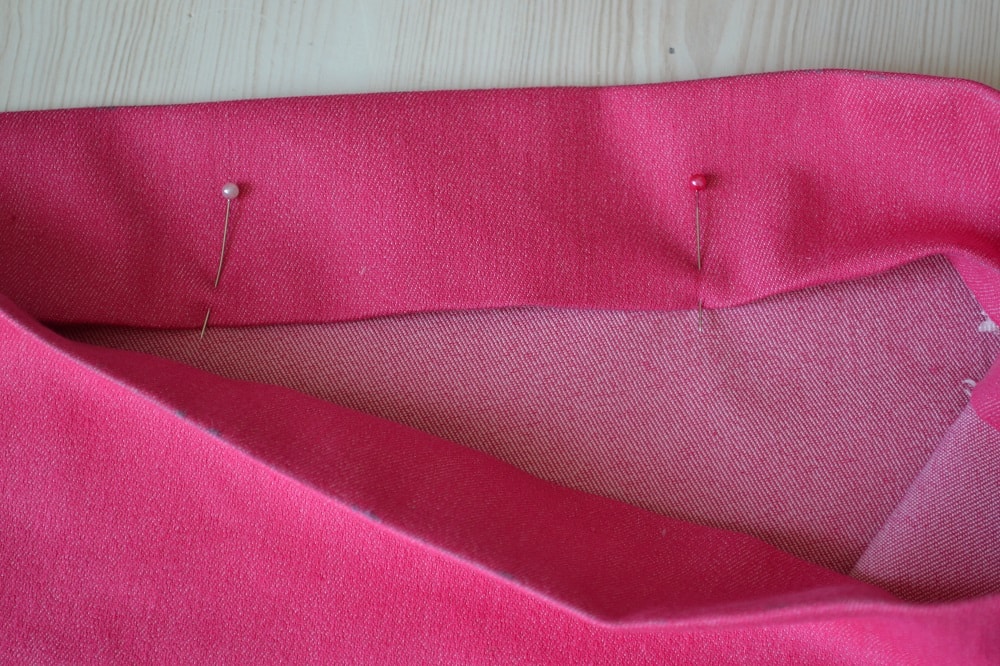 Pin the fold before stitching