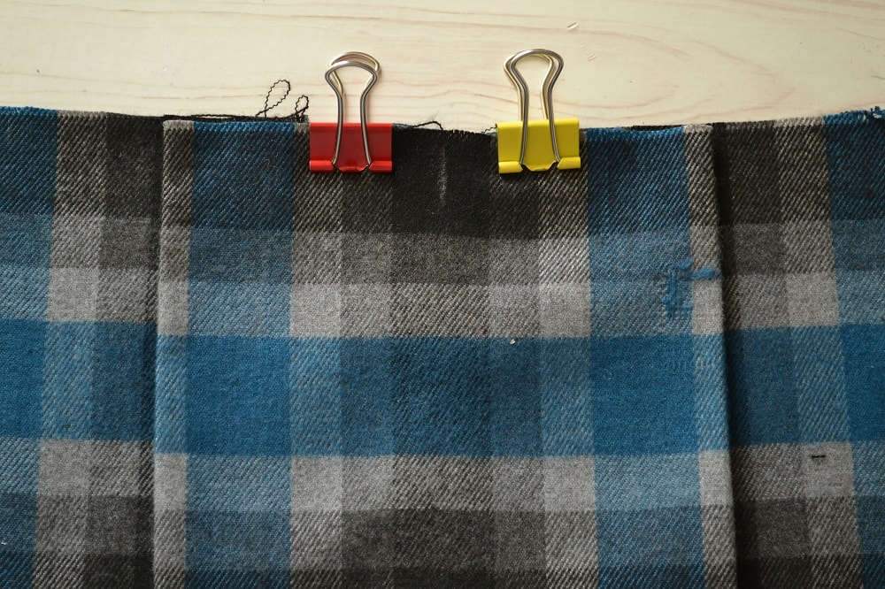 Wrong side of a box pleated skirt